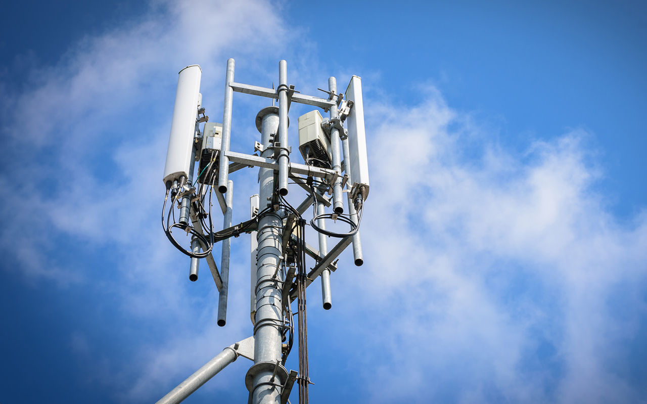 Cell tower with blue sky